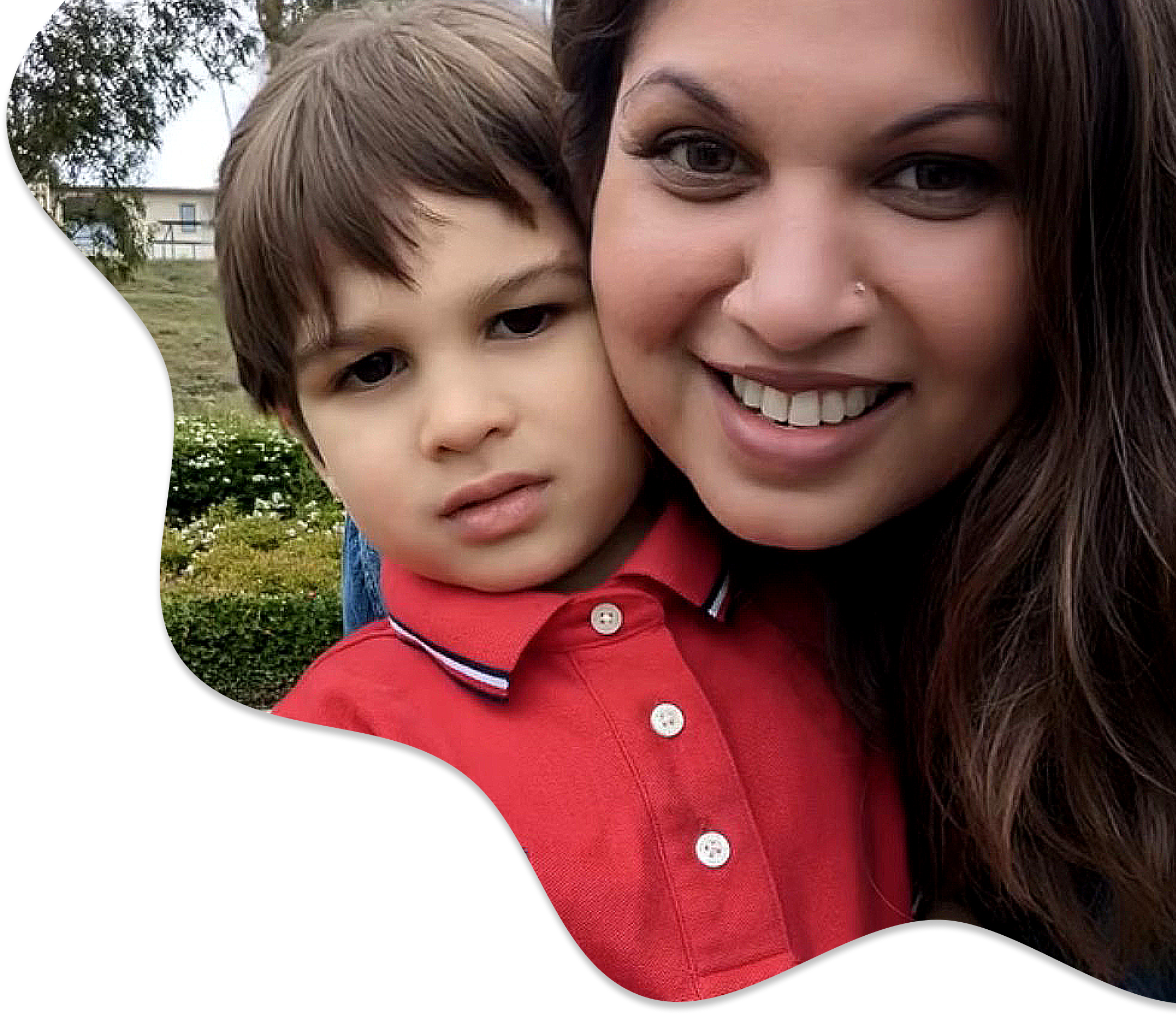 Amber, the founder, smiling with her young son Xion