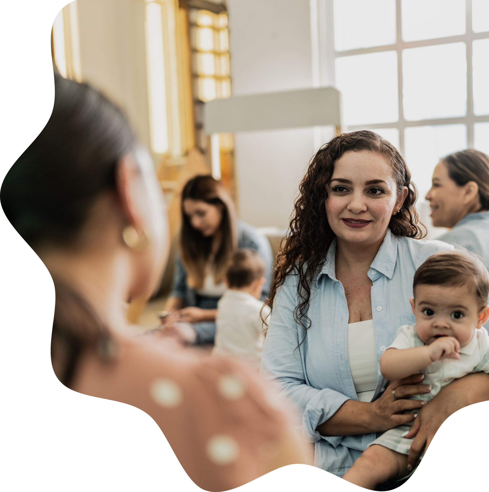 Parents and young children gathering at a childcare center