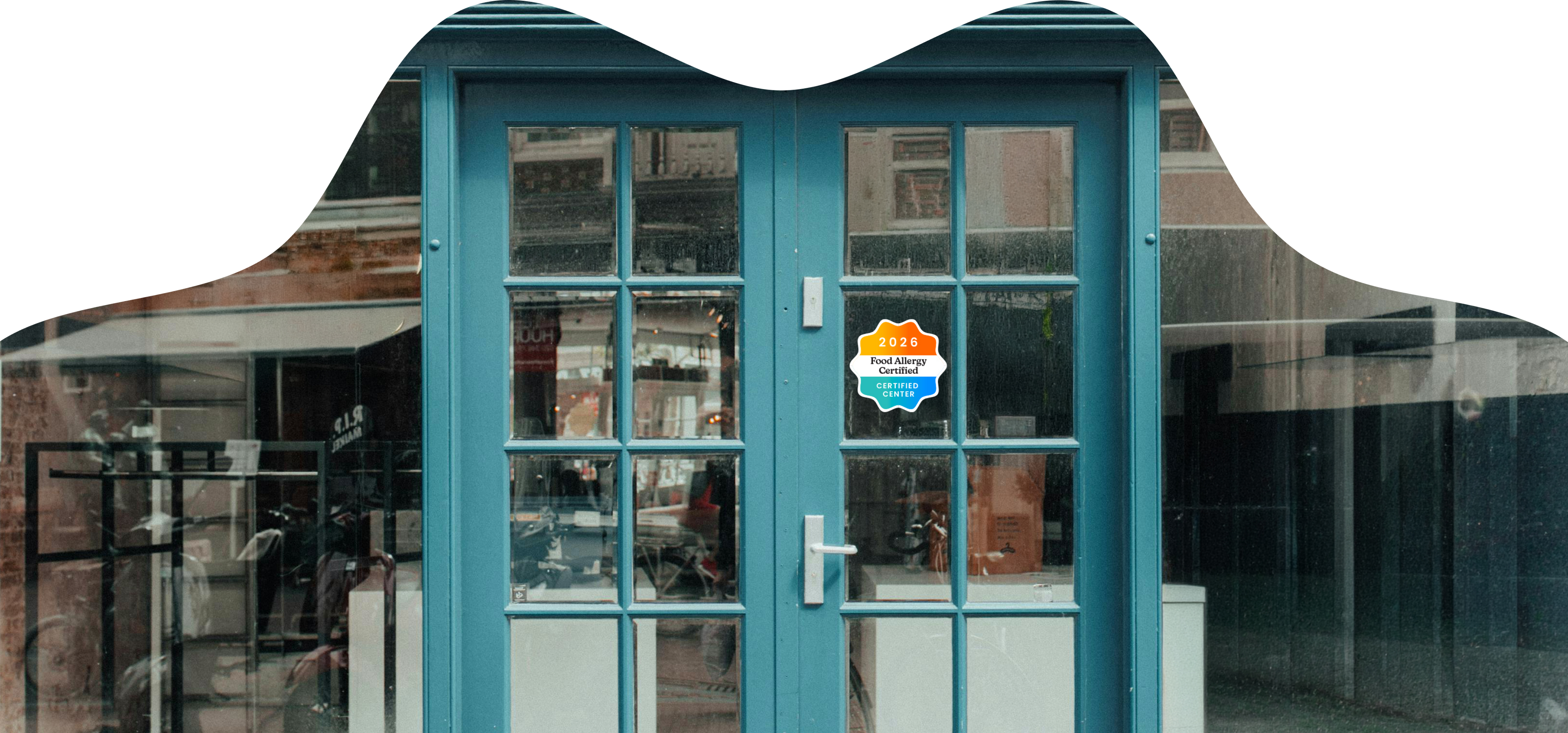 A certified center storefront displaying the Food Allergy Certified decal