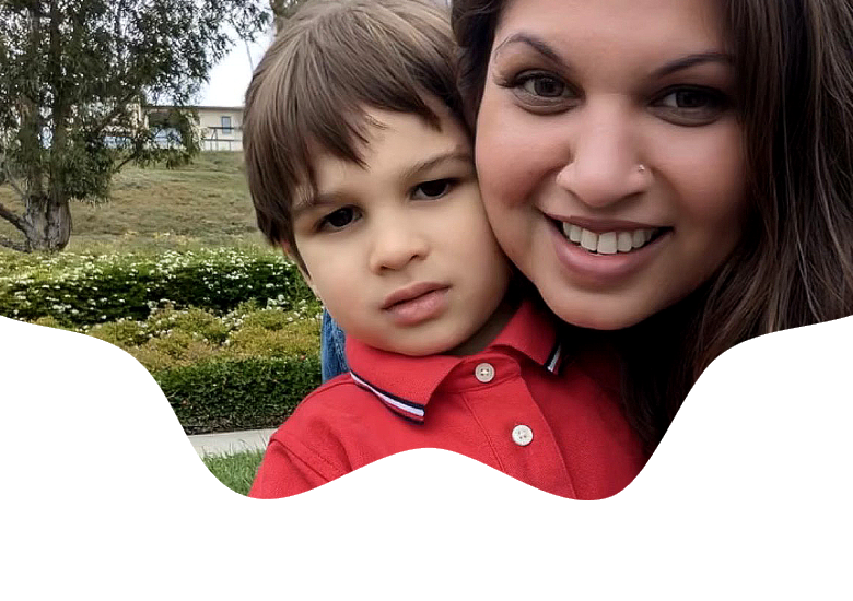 Amber, the founder, smiling with her young son Xion